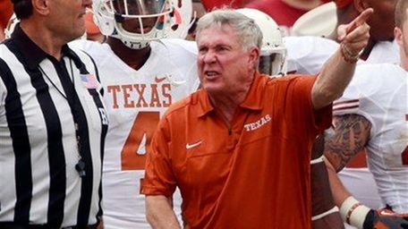 Texas head coach Mack Brown yells at an