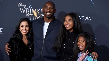 From left, Vanessa Bryant, Kobe Bryant, Natalia Bryant