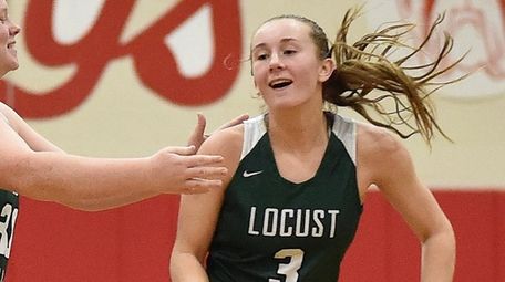 Julia Sabatino of Locust Valley gets congratulated by