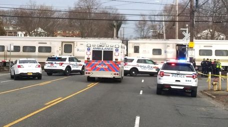 Police and emergency officials at the LIRR Farmingdale