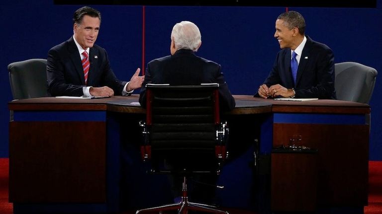 Republican presidential nominee Mitt Romney answers a question