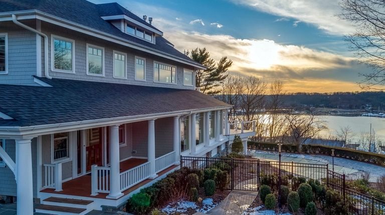 The house has sunset views over Huntington Harbor.