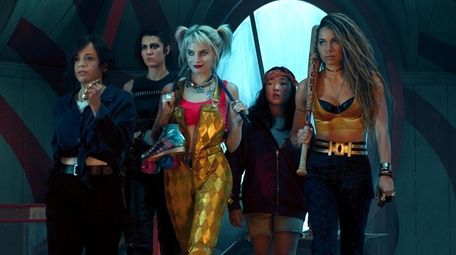(L-r) Rosie Perez as Renee Montoya, Mary Elizabeth