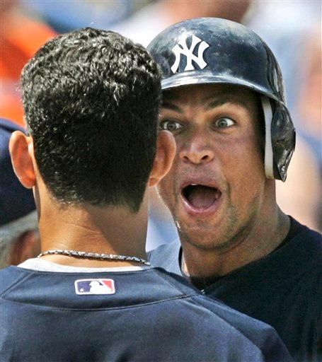 Alex Rodriguez reacts with surprise as he greets