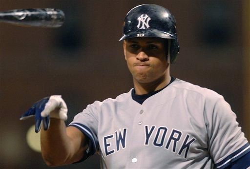 Alex Rodriguez tosses his bat in disgust after
