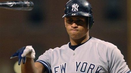 Alex Rodriguez tosses his bat in disgust after