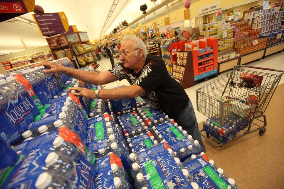 Edward Ogonowski stocks up on bottled water at