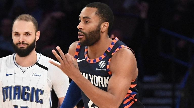 Knicks guard Wayne Ellington reacts after he sinks