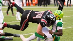 New York Guardians #44 Ryan Mueller tackles Tampa