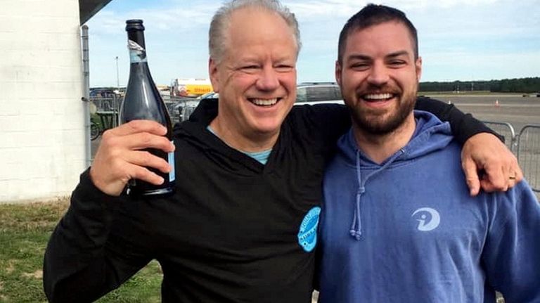 Dan Martinsen, left, celebrates with his son Danny
