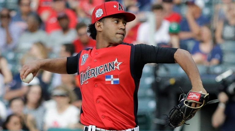Deivi Garcia, of the Yankees, throws during the