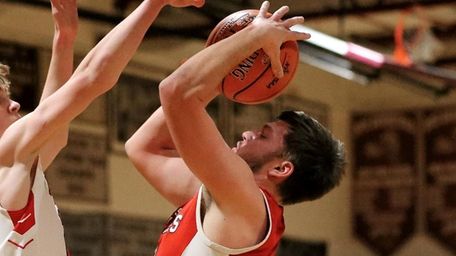 Southold guard Nick Grathwohl gets fouled on the