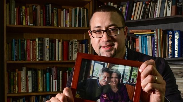 Stony Brook University Assistant Professor Zebulon Miletsky holds