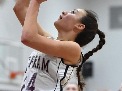 Hailey Guerrero #24 of Mepham, left, shoots during