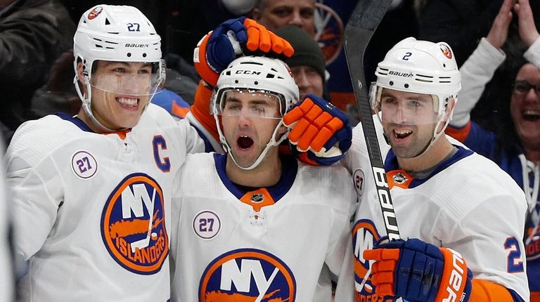 Jordan Eberle of the Islanders, center, celebrates his