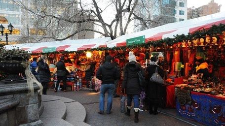 Shoppers walk through a previous Union Square Holiday