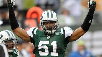 New York Jets linebacker Aaron Maybin reacts during