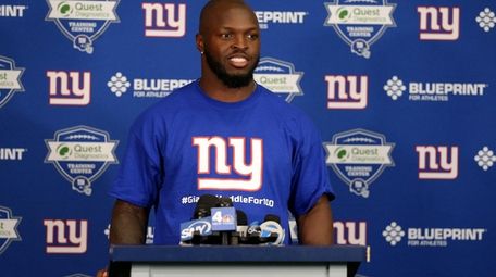 Giants linebacker Alec Ogletree speaks to the media