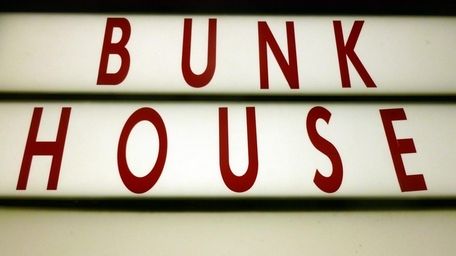 A sign outside the Bunk House lounge in