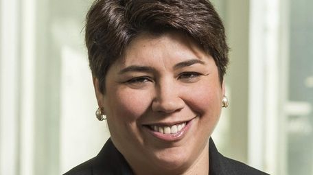 Domenique Camacho Moran, a partner at Farrell Fritz