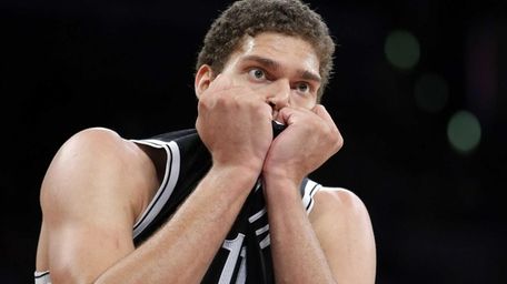 Brooklyn Nets center Brook Lopez reacts to a