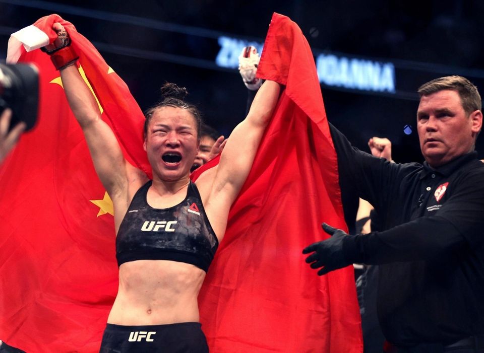 Zhang Weili celebrates her win by decision over