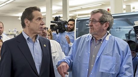 Gov. Andrew M. Cuomo and Michael J. Dowling,