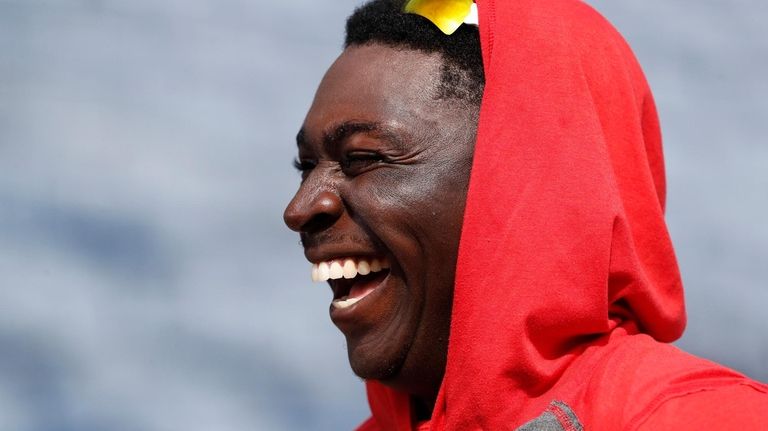 Phillies shortstop Didi Gregorius laughs during a pregame