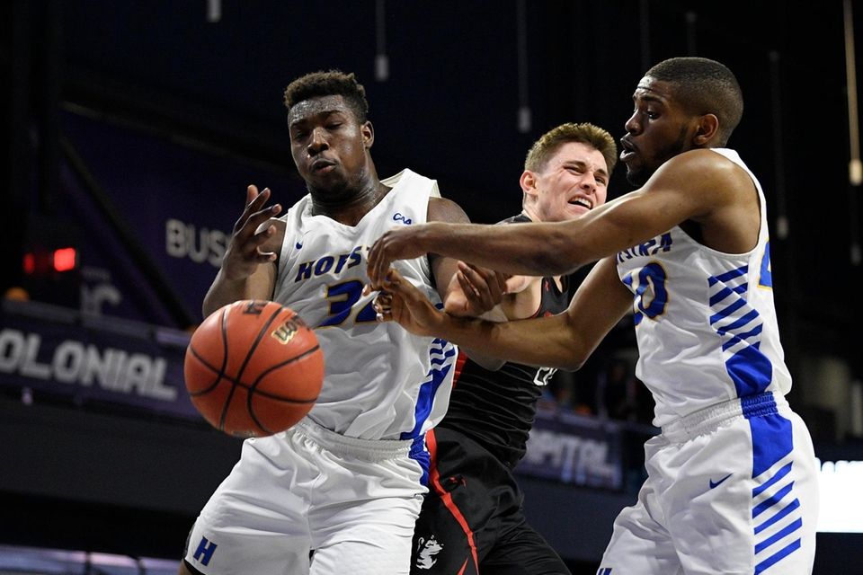 Hofstra forward Isaac Kante, left, and guard Jalen