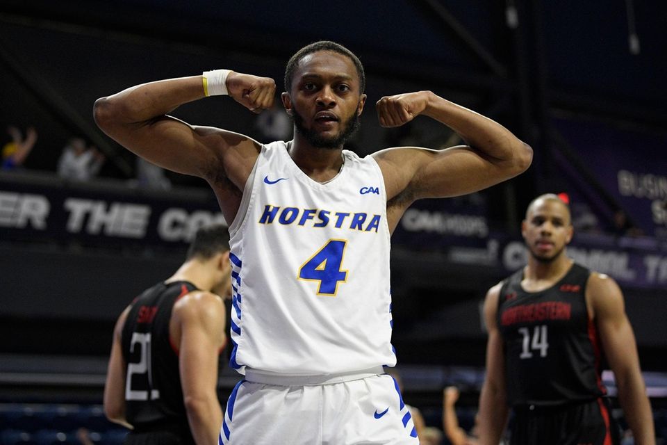 Hofstra guard Desure Buie reacts after he was