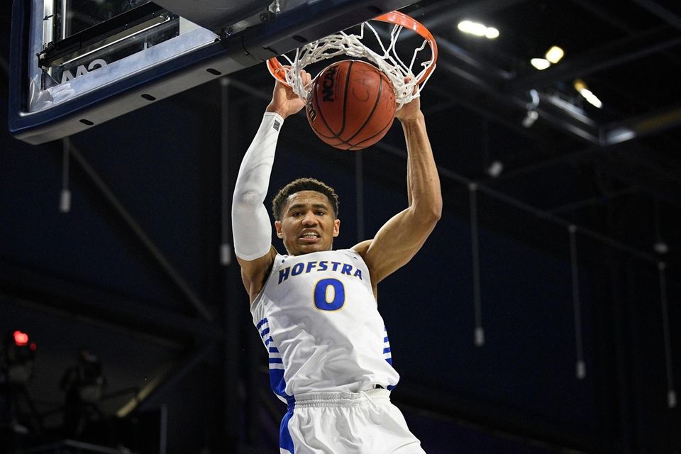 Hofstra guard Tareq Coburn dunks during the second
