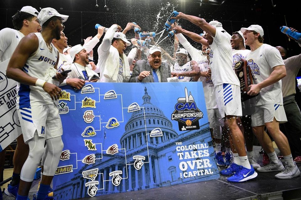 Hofstra coach Joe Mihalich is showered with water