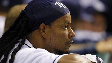 Tampa Bay Rays outfielder Manny Ramirez watches during