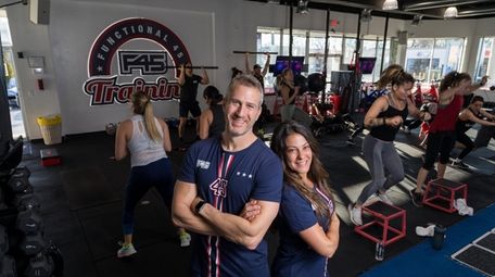 Marc Arnberg, left, and partner Rachael Garafola, seen