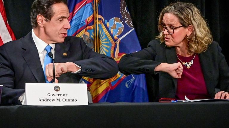 Gov. Andrew Cuomo elbow bumps Nassau County Executive