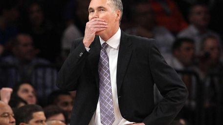 Lakers head coach Mike D'Antoni stands on the