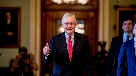 Senate Majority Leader Mitch McConnell of Ky. gives