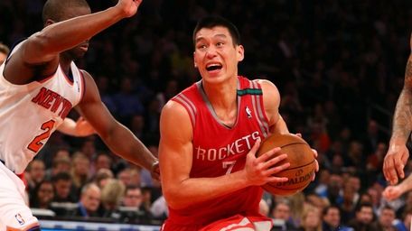 Jeremy Lin of the Houston Rockets drives to