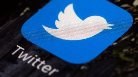 The Twitter app icon on a mobile phone