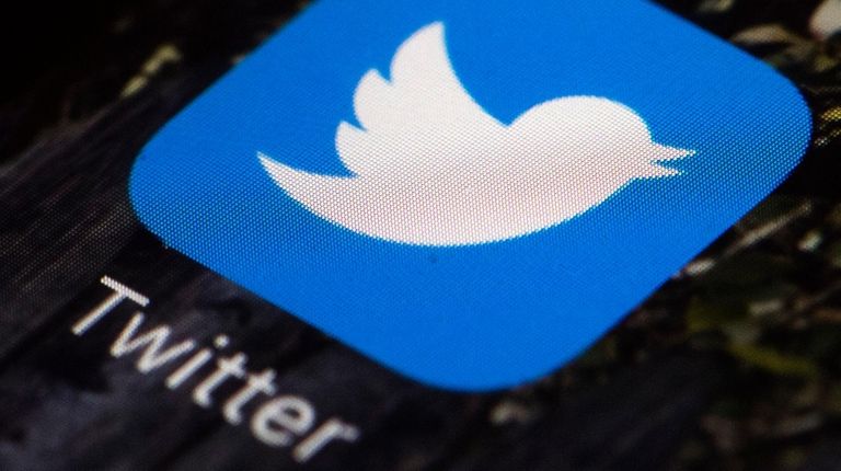 The Twitter app icon on a mobile phone
