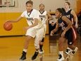 St. Anthony's guard Chastity Taylor dribbles past St.
