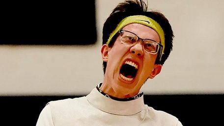 Great Neck South's Gabriel Magidson reacts after defeating