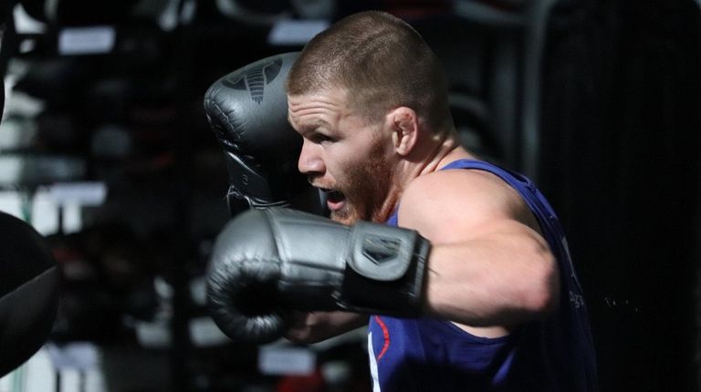 Huntington's Matt Frevola hits pads on Thursday, Oct.