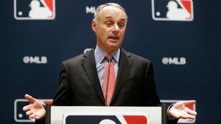 MLB commissioner Rob Manfred speaks to the media