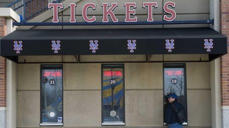 A Mets fan at the ticket window at