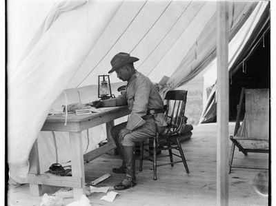 Theodore Roosevelt in his camp tent, Camp Wikoff,