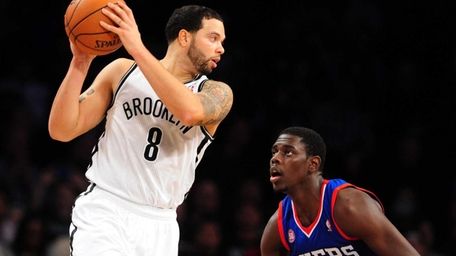 Deron Williams of the Brooklyn Nets is guarded