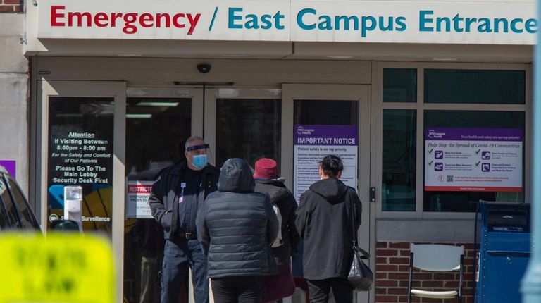 A line forms outside NYU Winthrop University emergency