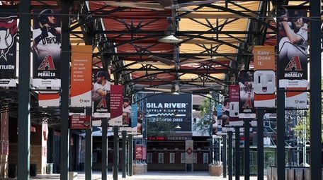 The walkways outside of Chase Field are empty