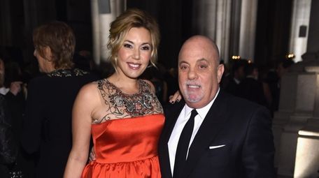 Billy Joel and his wife, Alexis, attend the